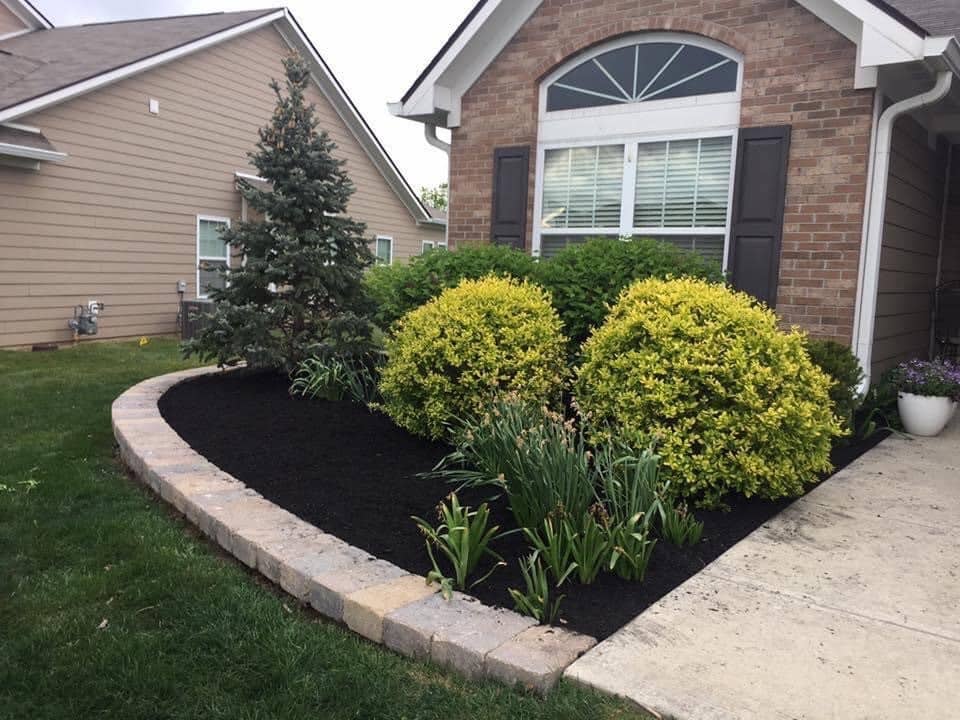 Flower bed mulching services in Noblesville, IN.